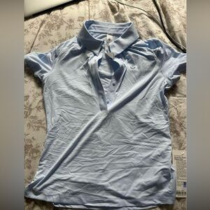 Lululemon women’s golf shirt. Size 6. New with tags